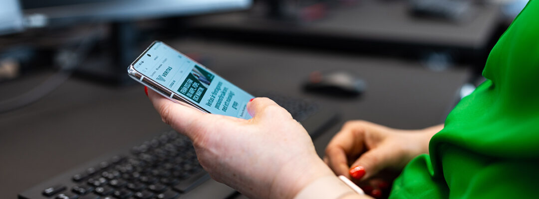 An employee is looking at Veritas